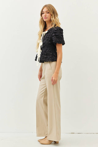 BUBBLE BABYDOLL BLOUSE WITH TEXTURED FABRIC AND CONTRAST BOW