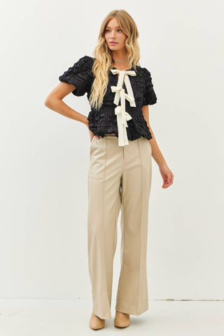 BUBBLE BABYDOLL BLOUSE WITH TEXTURED FABRIC AND CONTRAST BOW