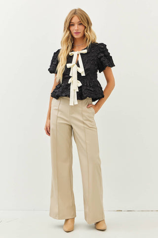 BUBBLE BABYDOLL BLOUSE WITH TEXTURED FABRIC AND CONTRAST BOW