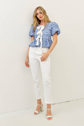 BUBBLE BABYDOLL BLOUSE WITH TEXTURED FABRIC AND CONTRAST BOW