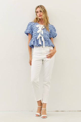 BUBBLE BABYDOLL BLOUSE WITH TEXTURED FABRIC AND CONTRAST BOW